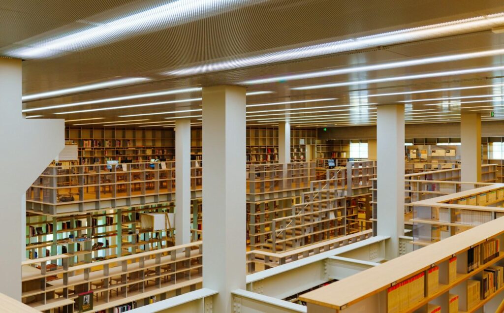 Bookshelves over two levels in a public library